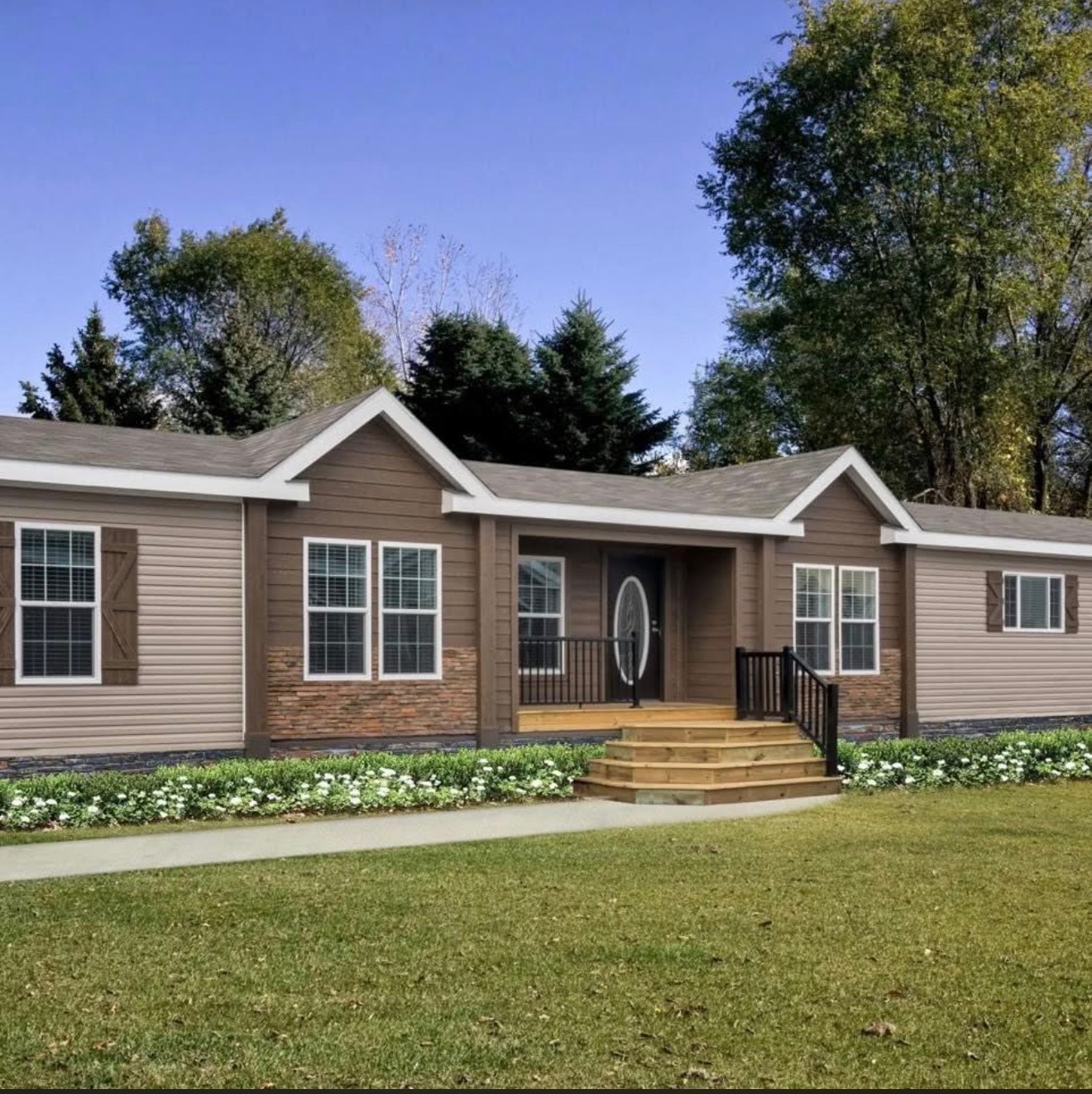 Modern manufactured home with landscaping